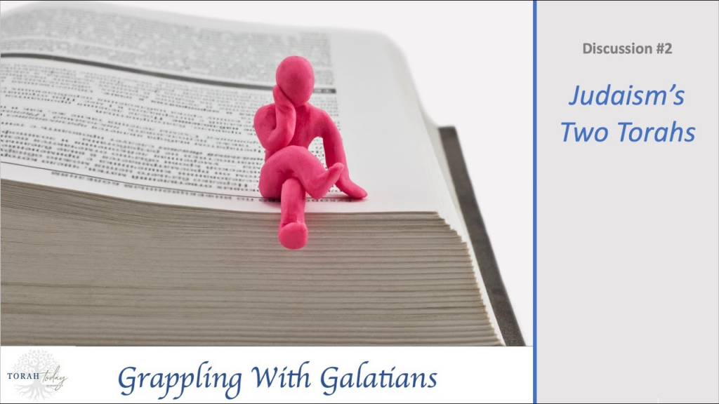 Grappling with Galatians. Discussion #2 Title - Judaism's two torahs. image of a pink clay man witting in a thinking position legs crossed on the edge of an open book
